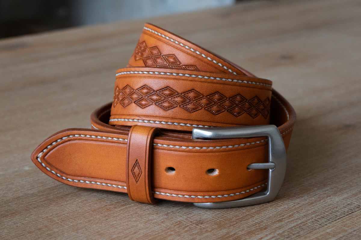Handmade russet brown leather belt, stitched and embossed by hand. Rustic style with brushed nickle finish solid brass buckle. 