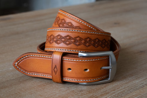 Handmade russet brown leather belt, stitched and embossed by hand. Rustic style with brushed nickle finish solid brass buckle. 